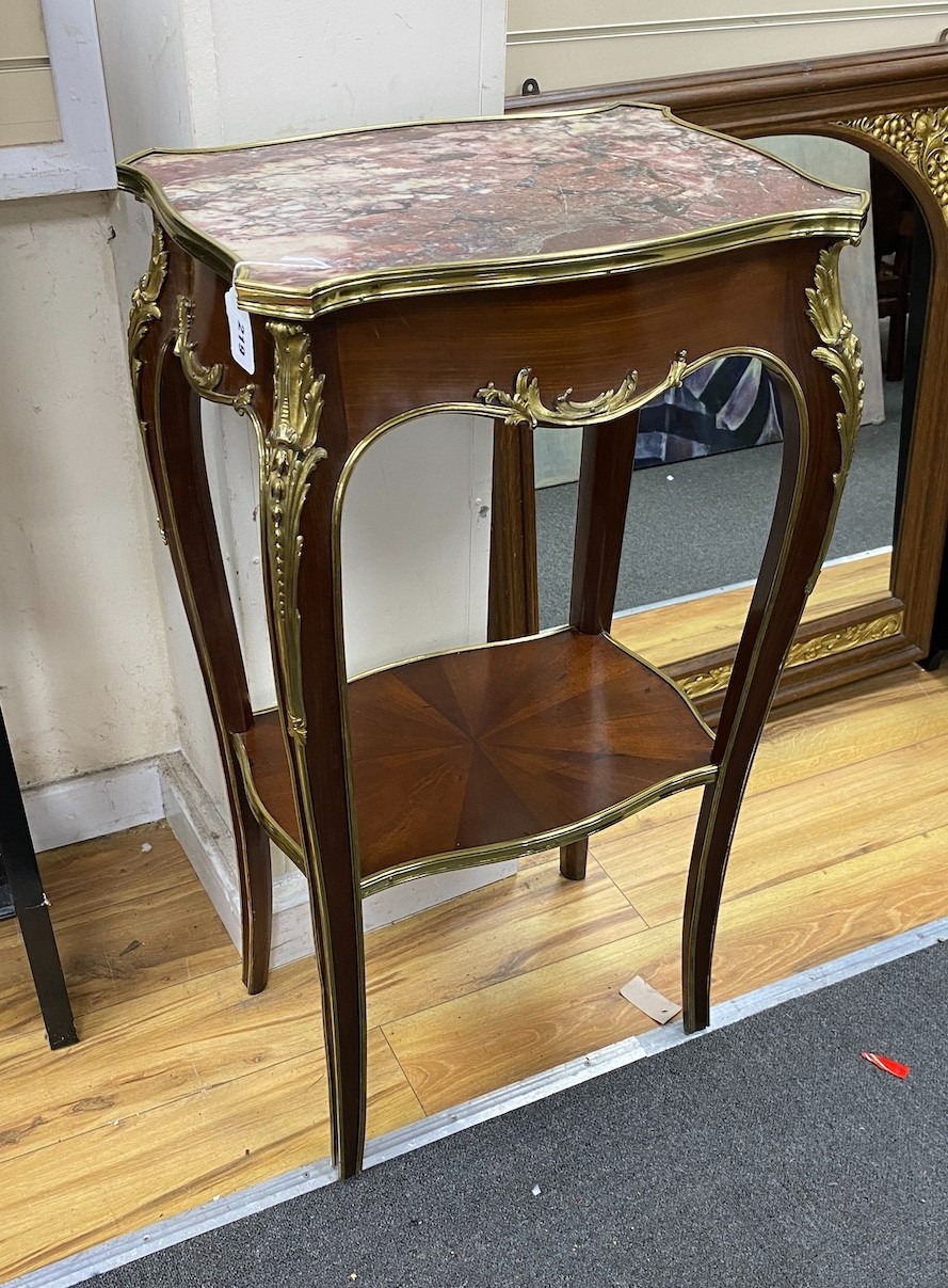 A mid 20th century French gilt metal mounted mahogany marble topped two tier table, width 50cm, depth 35cm, height 95cm